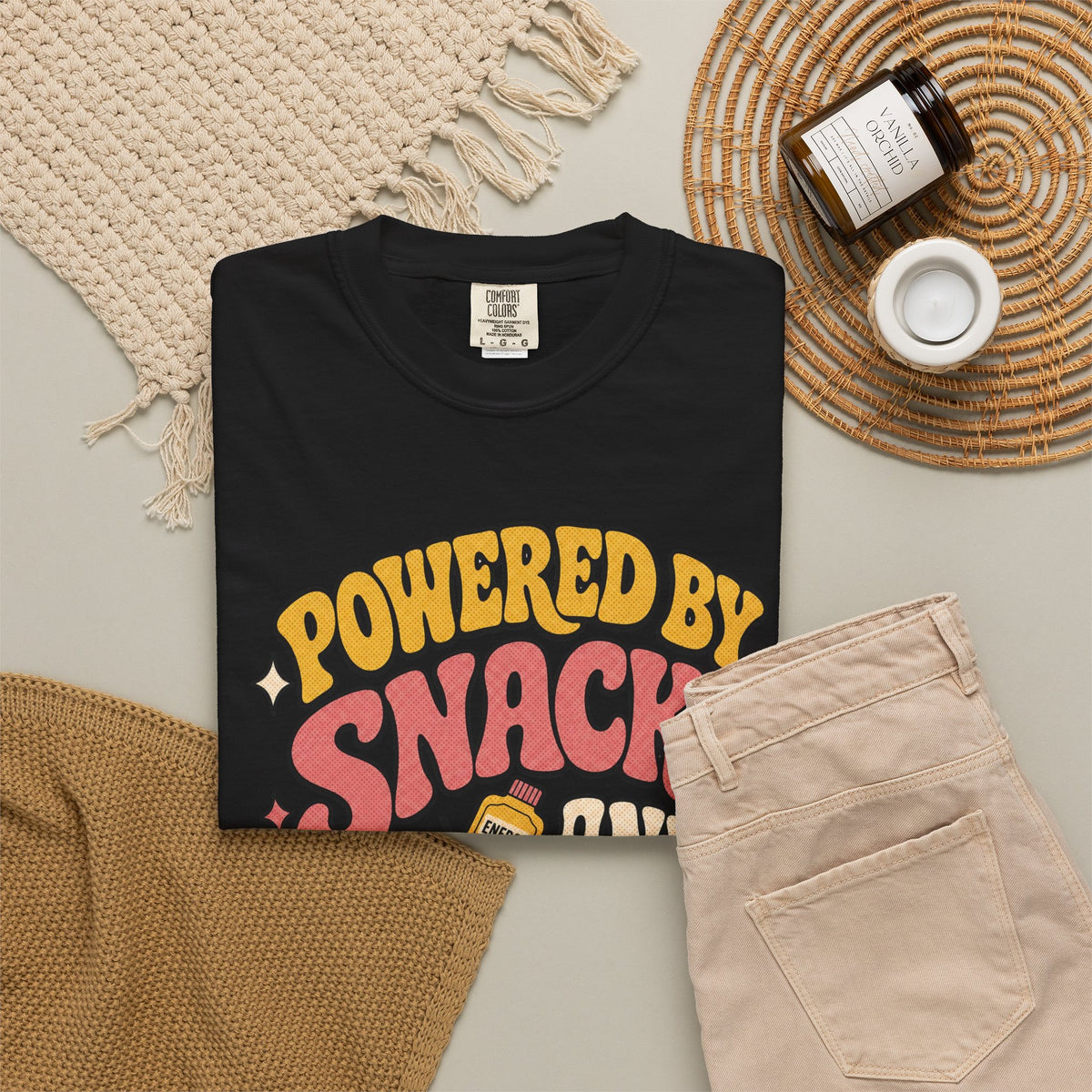 Powered by Snacks and Spite T-shirt - Black - Flat Lay