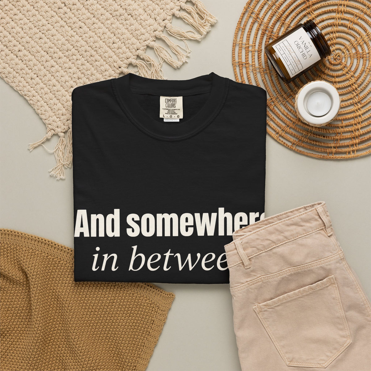 And Somewhere In Between T-shirt - Black - Flat Lay
