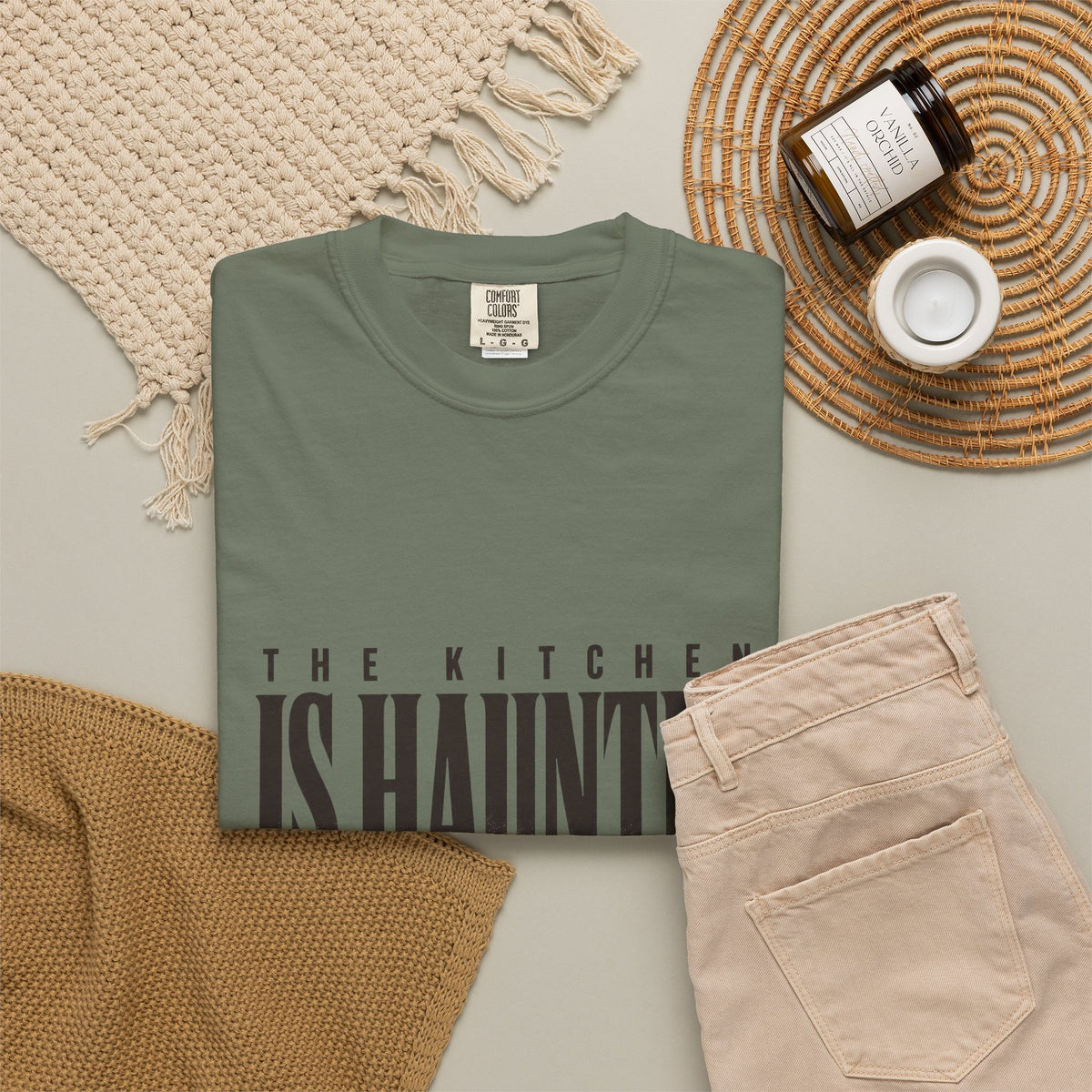 The Kitchen Is Haunted T-Shirt - Moss - Flat Lay