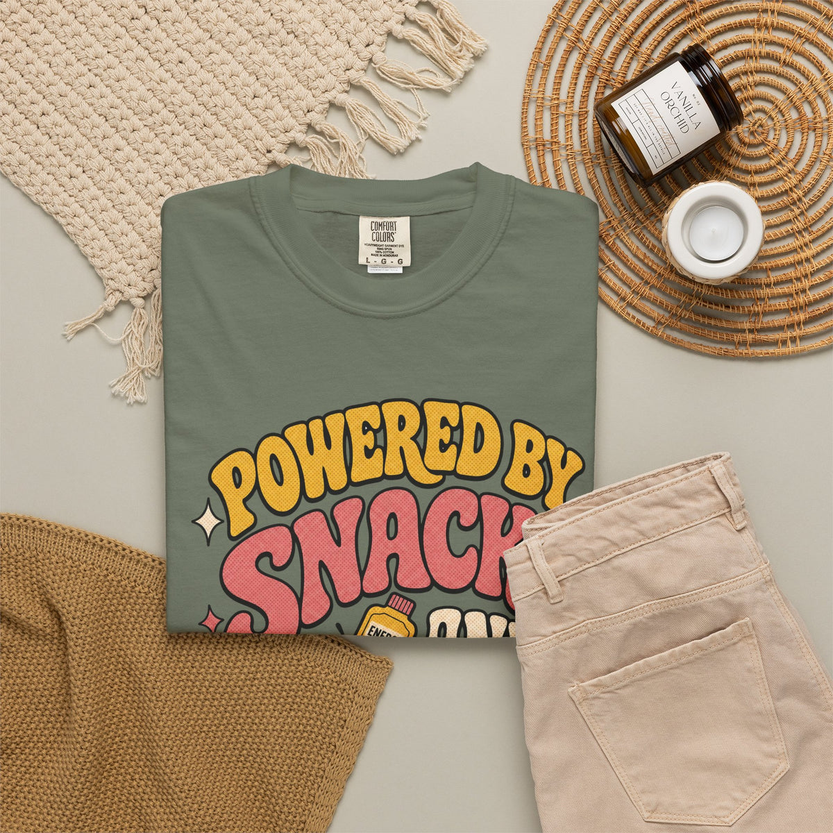 Powered by Snacks and Spite T-shirt - Moss - Flat Lay
